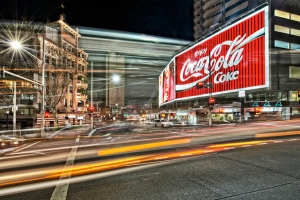 Bombarded by dazzling ad billboards, such as this iconic one at Sydney’s Kings Cross …